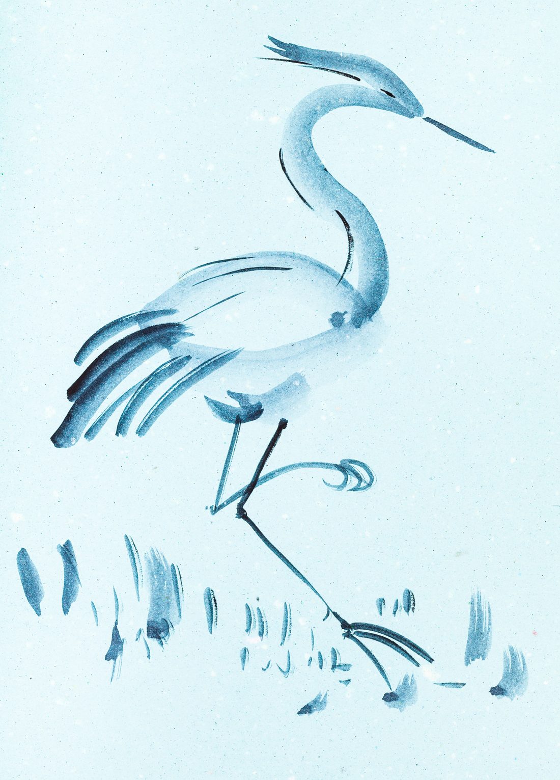 A great blue heron standing among tall grasses