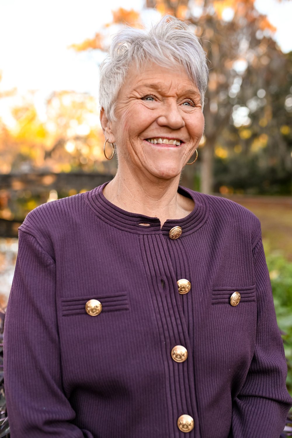 Linda Williams smiling outdoors